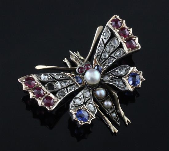 A Victorian gold and silver, ruby, sapphire, pearl and rose cut diamond set bug brooch, diameter 1.25in.